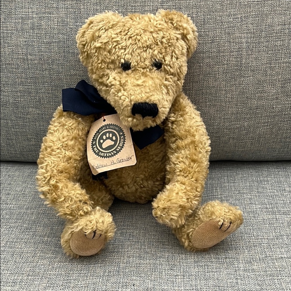 Classic Tan Boyds Bear collectible with Navy Bow and squeaker